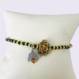 Black and Yellow Beaded Bracelet with Gold tone bee hive Charm